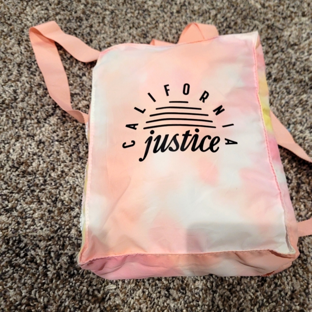 Justice convertible jacket/backpack